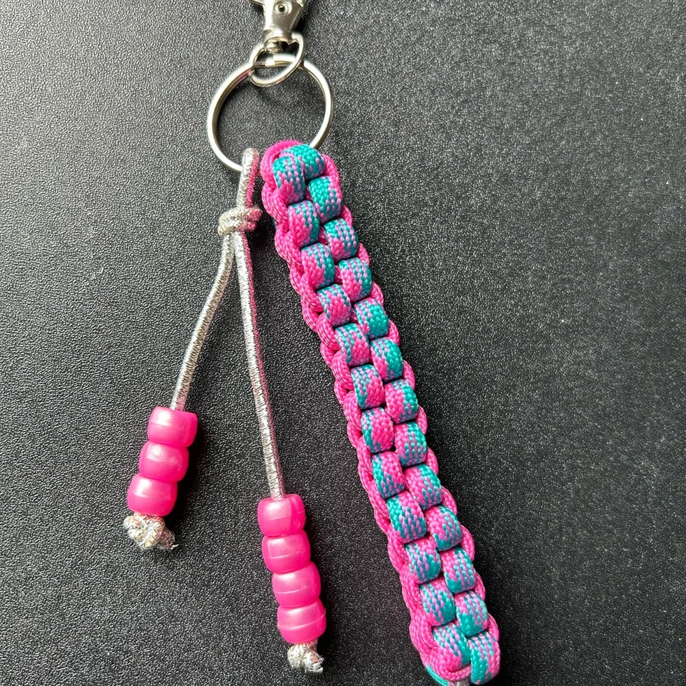 Pink/teal handmade paracord keychain/purse charm with silver hardware